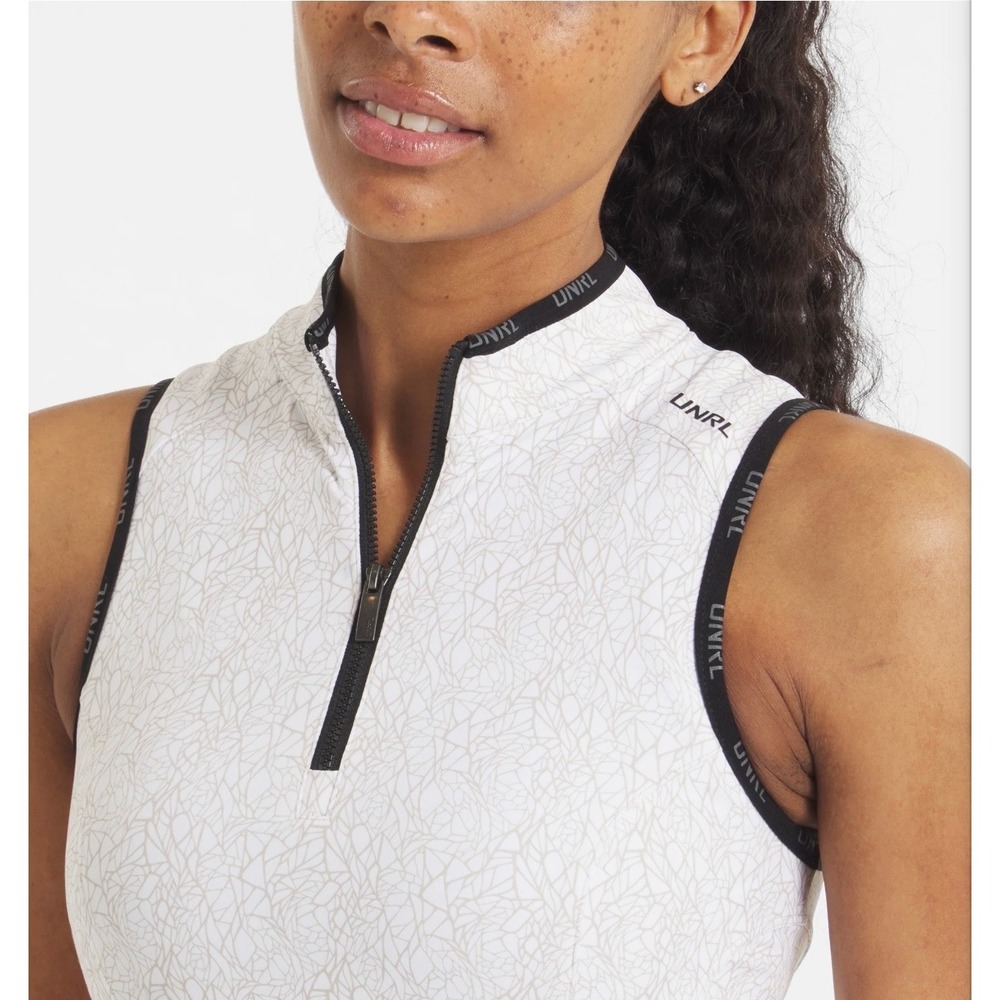UNRL PERFORMA SLEEVELESS POLO
White-Beige Women's XL (702) - Picture 2 of 11
